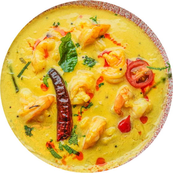 Prawn moilee: prawns in a yellow coconut sauce with a dried red chilli
